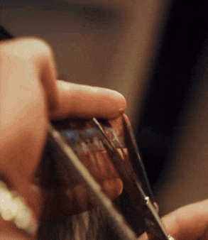 woman-getting-haircut-and-styling-at-salon